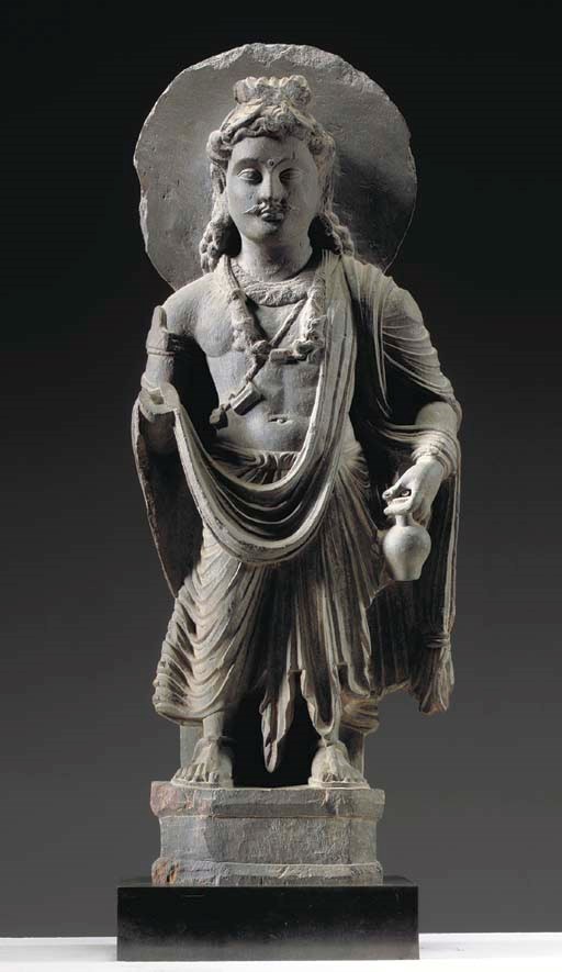 A Gray Schist Figure of Maitreya