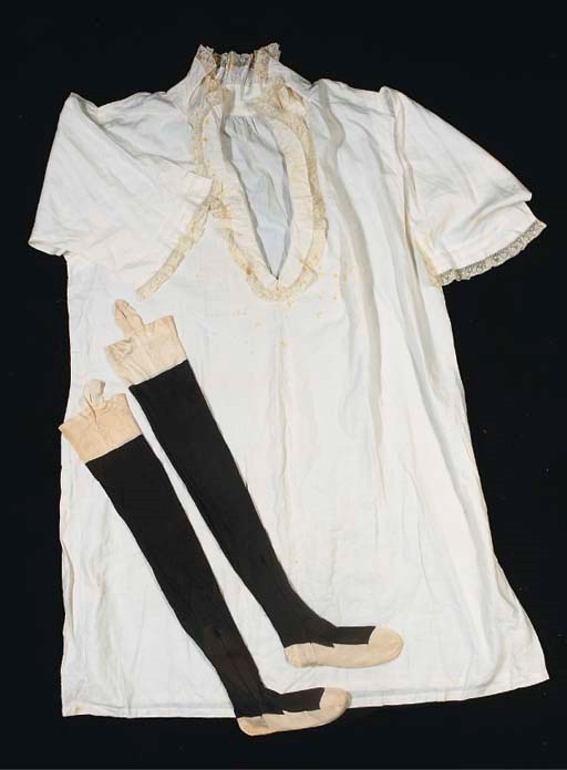 Queen Victoria's nightgown of fine cotton, with Valenciennes trimmed collar, monogrammed VR 36; a pair of black stockings with cream silk feet, also monogrammed VR, and also '5'; and a chemise, also trimmed with Valenciennes lace, monogrammed in blue VR 34