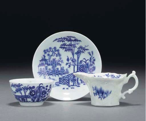 A Worcester blue and white teabowl and saucer and a creamboat