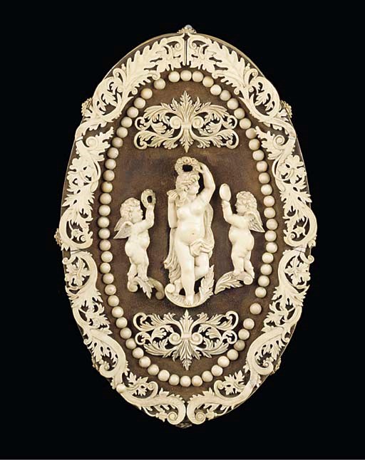 A relief carved bone and felt panel