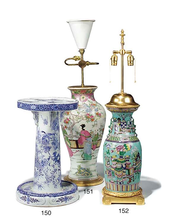 A JAPANESE BLUE AND WHITE GLAZED PORCELAIN STICK STAND