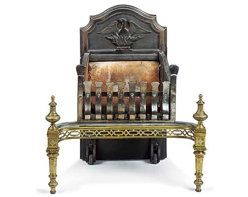 A WROUGHT AND CAST STEEL AND BRASS MOUNTED FIREGRATE
