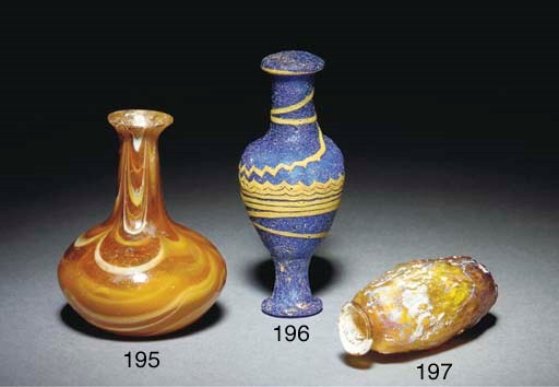 A HELLENISTIC BLUE CORE-FORMED GLASS UNGUENTARIUM