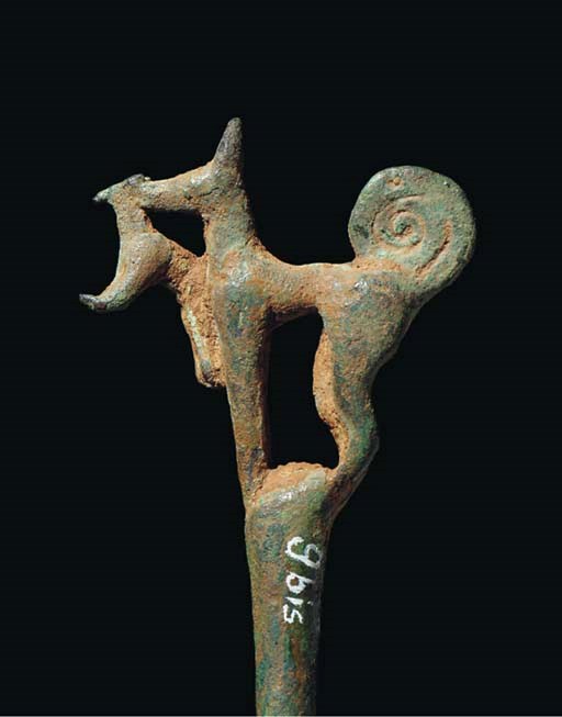 AN ANATOLIAN BRONZE PIN WITH HOUND