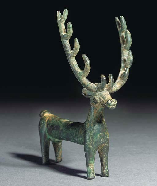 A KOBAN CULTURE BRONZE FIGURE OF A STAG
