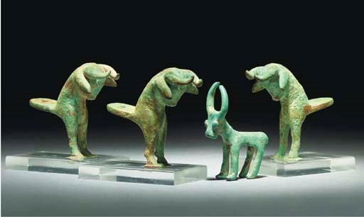THREE WESTERN ASIATIC BRONZE BULL PROTOMES