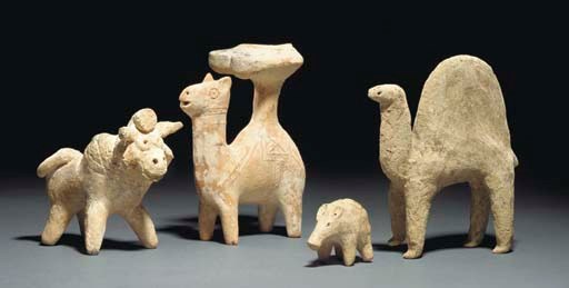 A WESTERN ASIATIC TERRACOTTA BOAR