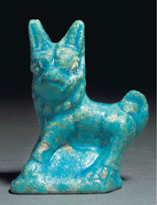 A ROMANO-EGYPTIAN TURQUOISE FAIENCE DOG