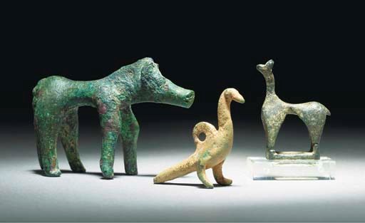 A GREEK BRONZE FIGURE OF A HORSE