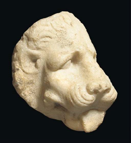 A GREEK MARBLE LION HEAD PROTOME