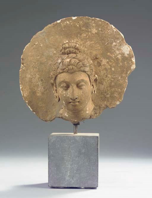 A Gandhara stucco head of Buddha Sakyamuni