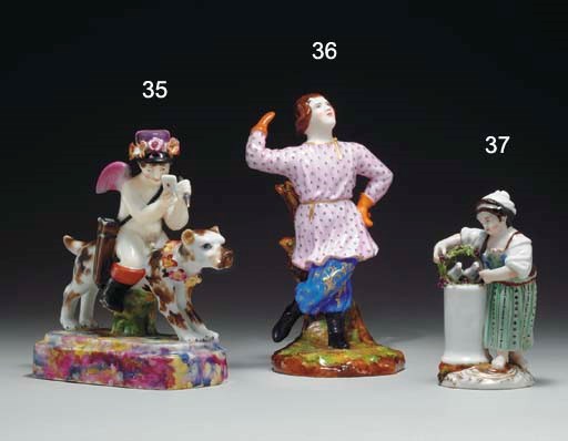 A PORCELAIN FIGURE OF A YOUNG GIRL