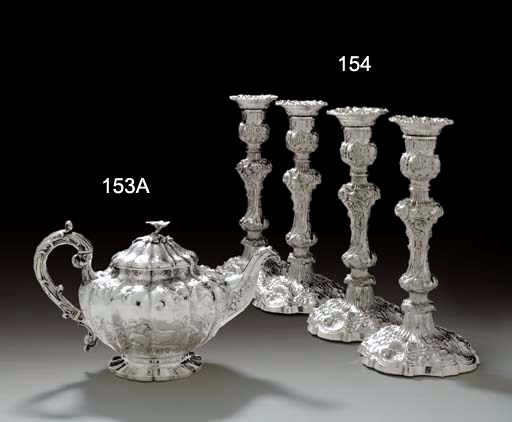 A SET OF FOUR WILLIAM IV SILVER CANDLESTICKS