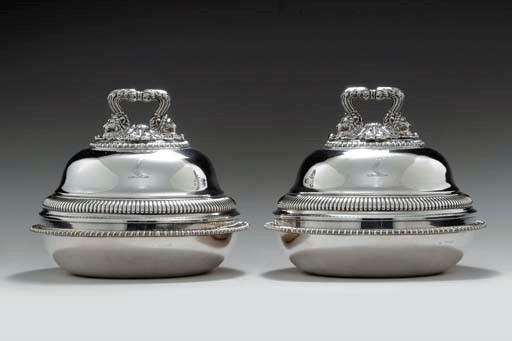 A PAIR OF REGENCY SILVER COVERED VEGETABLE DISHES