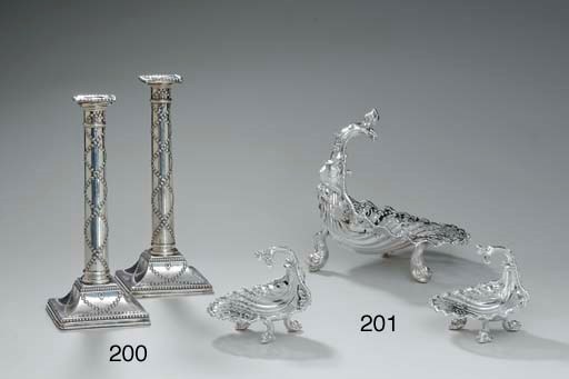 A PAIR OF GEORGE III SILVER CANDLESTICKS