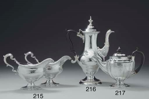 A GEORGE III SILVER COFFEE POT