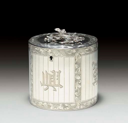 A GEORGE III SILVER TEA CADDY