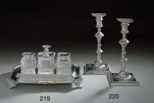 A PAIR OF GEORGE III SILVER CANDLESTICKS