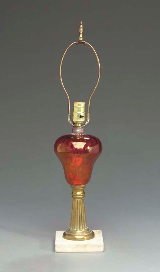 A PAIR OF VICTORIAN BRASS AND CLEAR CRANBERRY GLASS FLUID LAMPS,
