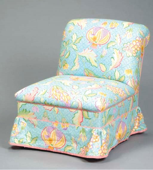 A CONTEMPORARY UPHOLSTERED SLIPPER CHAIR,