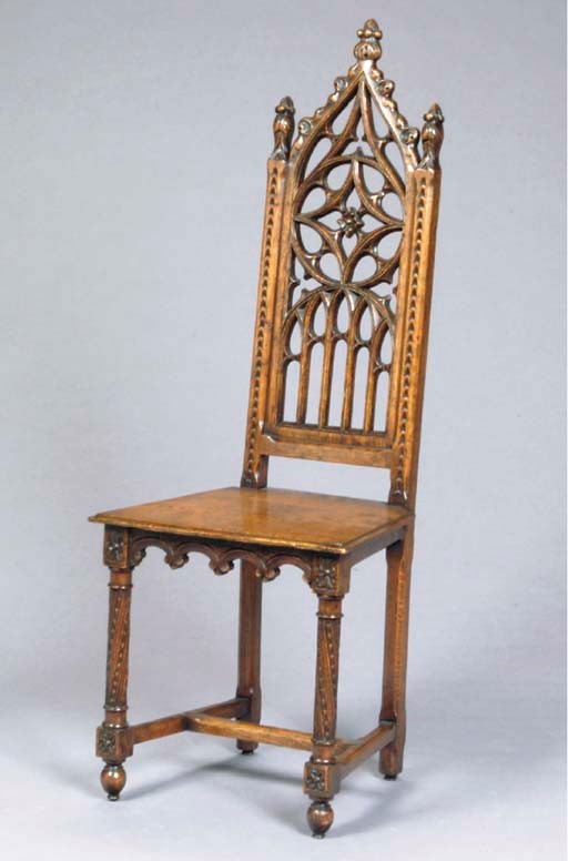 A PAIR OF VICTORIAN GOTHIC REVIVAL OAK HALL CHAIRS,