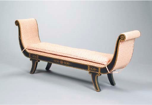A REGENCY STYLE PARCEL-GILT AND EBONIZED WINDOW BENCH,