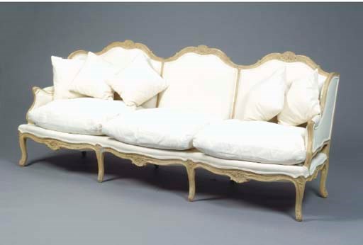 A LOUIS XV STYLE STAINED-BEECHWOOD SETTEE,
