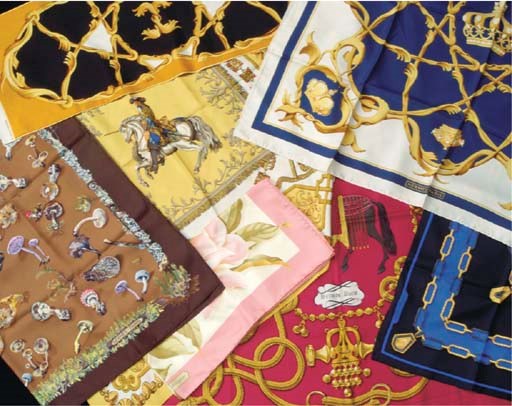 A GROUP OF SEVEN DESIGNER SILK SCARVES,