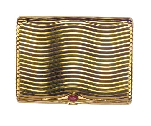 A GOLD AND RUBY CIGARETTE CASE