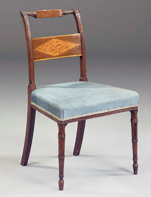 A SET OF FOUR REGENCY MAHOGANY AND SATINWOOD DINING CHAIRS