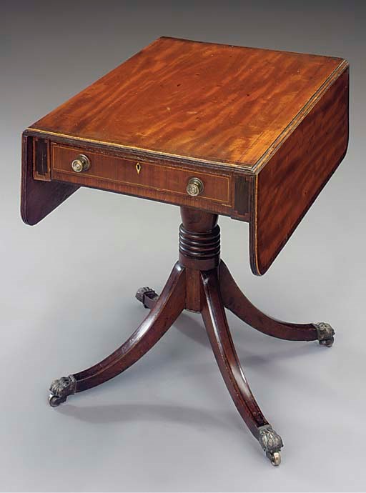 A mahogany, inlaid and ebonised pembroke table
