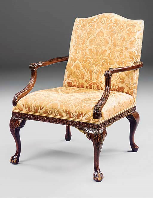 A mahogany and upholstered open armchair