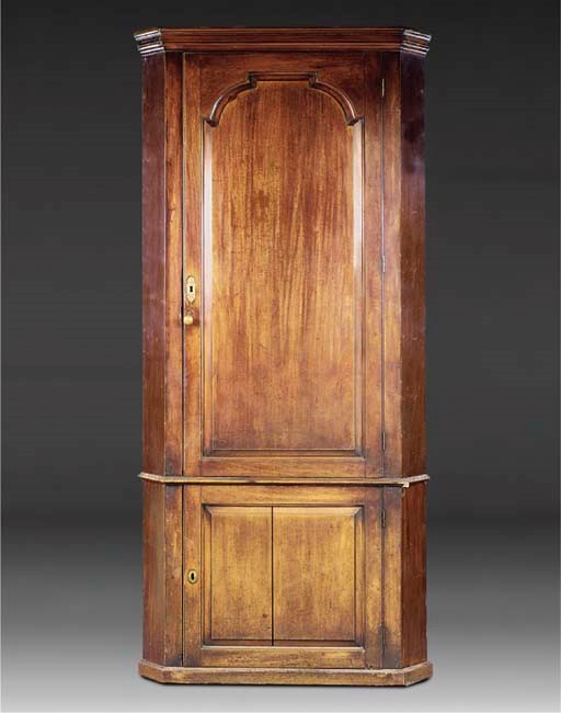 A GEORGE II MAHOGANY UPRIGHT CORNER CABINET