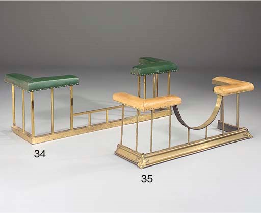 A brass and green leather upholstered club fender