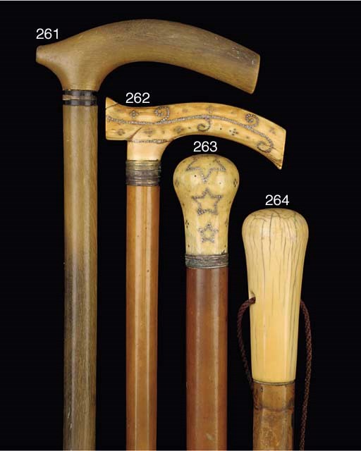 A VICTORIAN PIQUE WORK IVORY MOUNTED MALACCA WALKING STICK