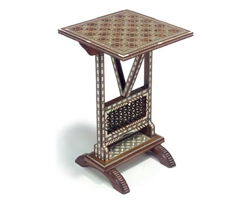AN INLAID BONE, EBONY AND MOTHER-OF-PEARL FOLDING GAMES TABLE
