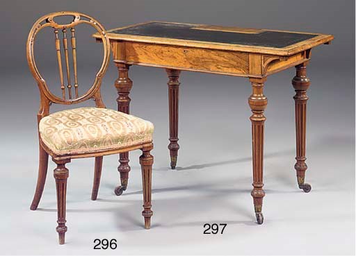 An early Victorian walnut writing table