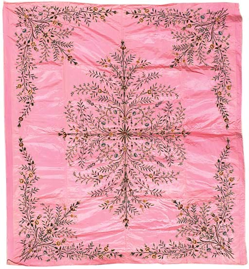 A tapestry-woven prayer hanging, woven in silks and metal thread with three gilt mosque lamps within a niche, with flowers to the borders--64½ x 46in. (164 x 117cm.), Turkish, early 20th century; and a cover of rose pink satin, embroidered in coloured chenilles with a variety of flowers on trailing stems, arranged around a central bouquet--88 x 82in. (224 x 208cm.), Turkish, late 19th century