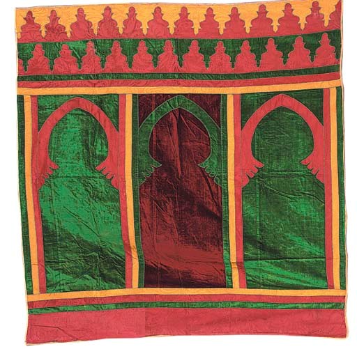 A small haiti tent hanging, composed of three arched mehrab niches of burgundy and emerald green silk velvet, applied with red and golden yellow silk damask--90 x 86in. (228 x 218cm.), Moroccan, 19th century