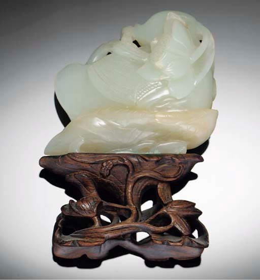 A Chinese pale celadon jade carving of a Mandarin duck, 18th/19th century