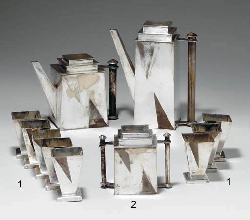 A SILVER-PLATED "SKYSCRAPER" THREE-PIECE TEA AND COFFEE SERVICE