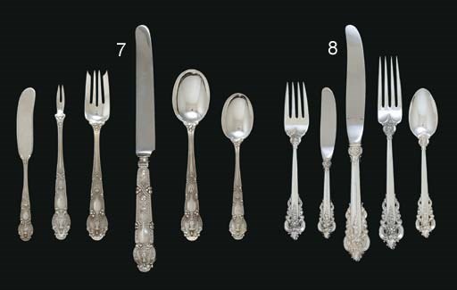 A SILVER FLATWARE SERVICE