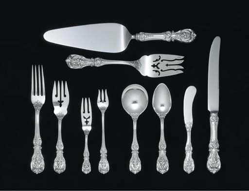 A SILVER FLATWARE SERVICE