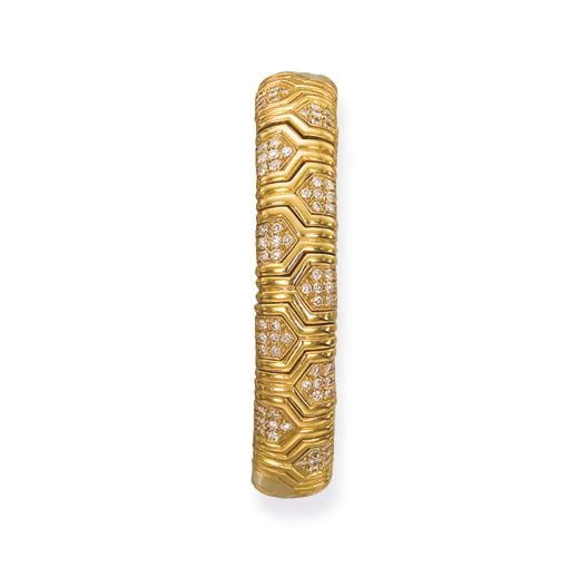 A GOLD AND DIAMOND BANGLE, BY BULGARI