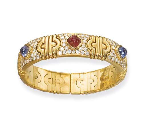 A GEM-SET AND DIAMOND 'PARENTESI' BANGLE, BY BULGARI
