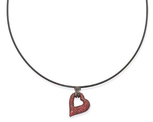 A RUBY AND BLACK DIAMOND HEART PENDANT