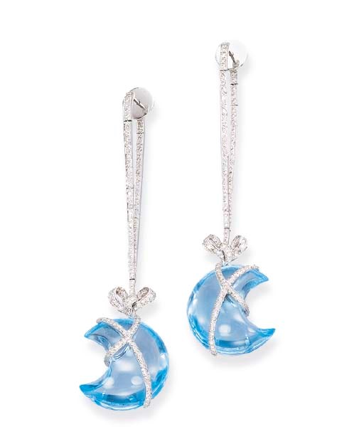 A PAIR OF BLUE TOPAZ AND DIAMOND EARRINGS