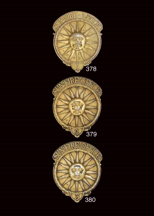 A GEORGE III SILVER-GILT SUN FIRE OFFICE FIREMAN'S ARM BADGE NUMBER 3