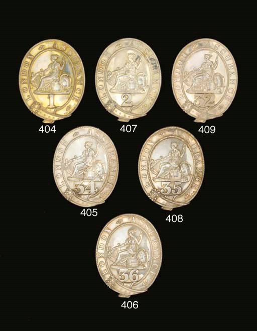 A WILLIAM IV SILVER-GILT LONDON ASSURANCE FIREMANS ARM BADGE NUMBER 2