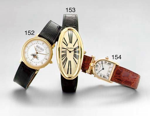 CARTIER. AN 18K GOLD STIRRUP-FORM WRISTWATCH